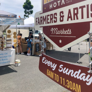 HOTA Market sign with NutMylk stall in the background